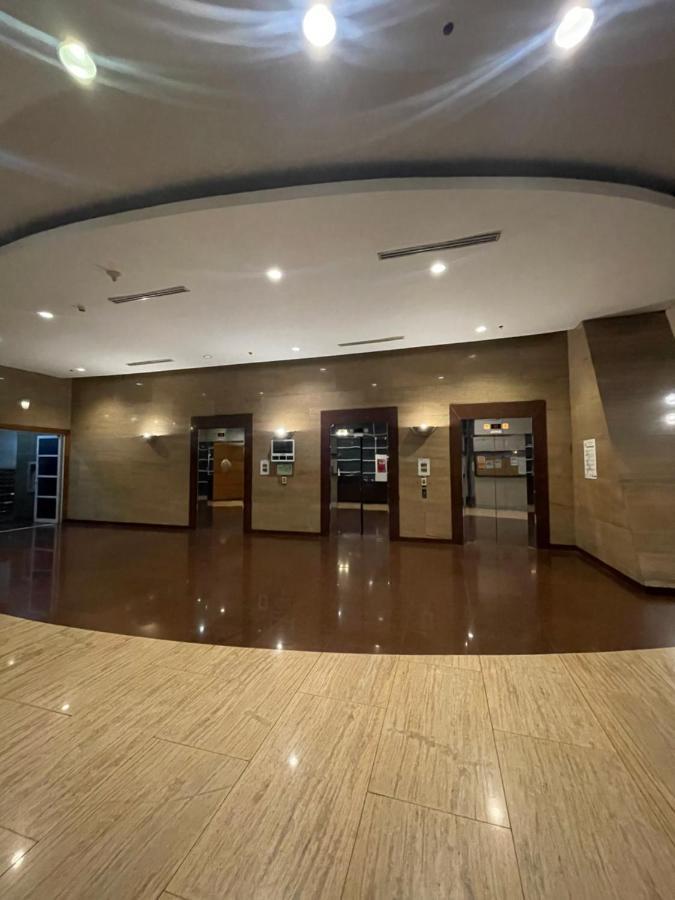 Pearl Of The Orient Tower, In Front Of Us Embassy Apartment Manila Exterior photo