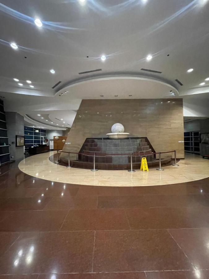 Pearl Of The Orient Tower, In Front Of Us Embassy Apartment Manila Exterior photo